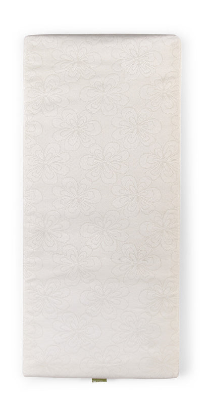 Close-up of Childhome Bedside Crib Mattress (50x90cm) with white, breathable cover.