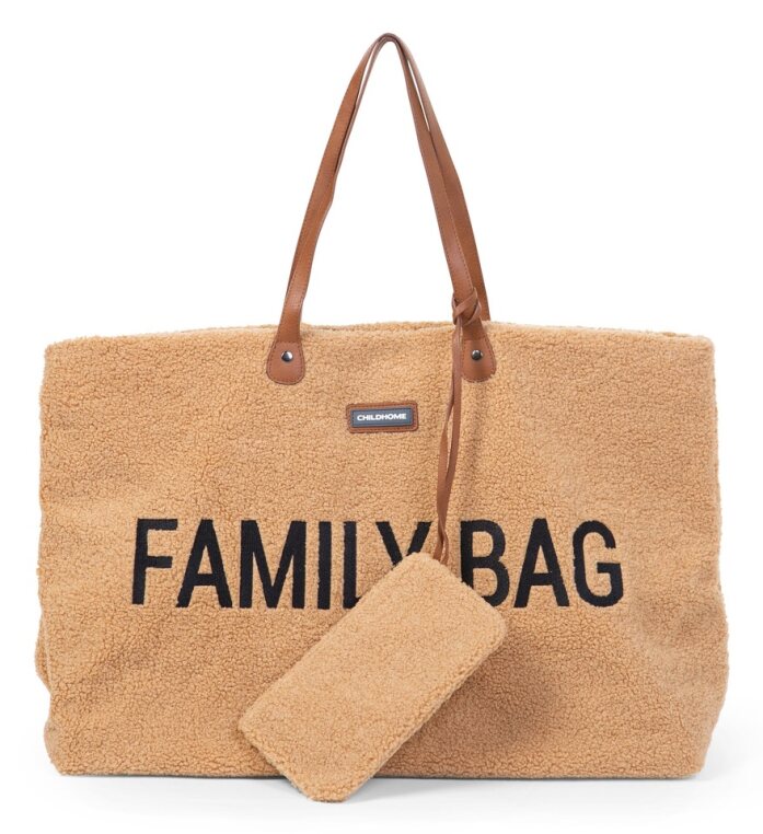 Family using the Childhome Family Bag (Teddy Brown color) while traveling.