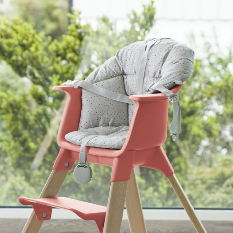 Stokke Clikk Cushion in use on a Stokke Tripp Trapp Chair