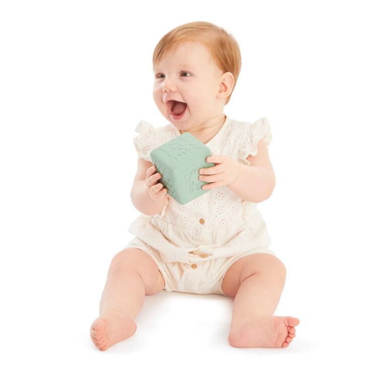 Baby Playing with Sophie la girafe Textured Cube