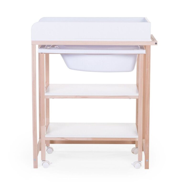 Childhome Changing Table &amp; Bath with Wheels in Use: White unit with parent attending to baby in the bath tub.