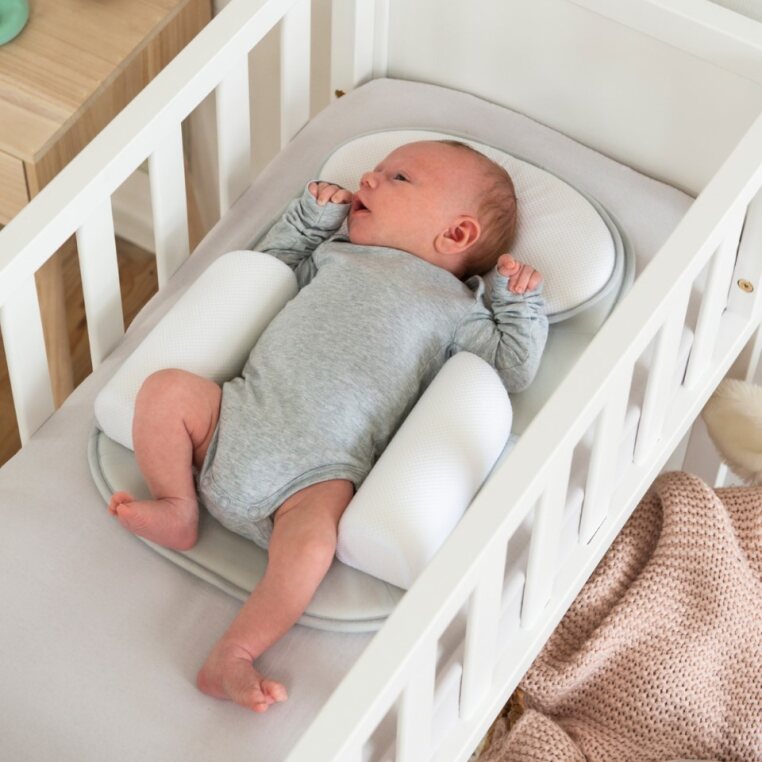 Baby sleeping comfortably on the Doomoo Basics Multi Sleep