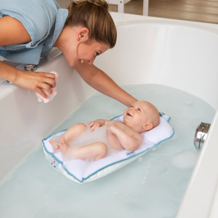 Doomoo Basics Easy Bath in use, with a baby floating comfortably