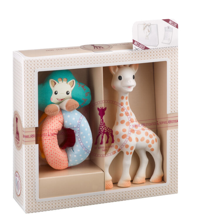 Sophie la Girafe plush toy with a baby swaddle