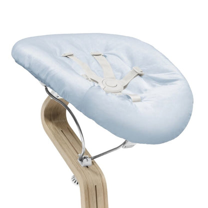 Stokke Nomi Newborn Set in cozy position for baby - White Grey Blue