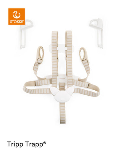 Stokke Tripp Trapp Harness - Front view of a child sitting in a Tripp Trapp chair with the harness securely fastened