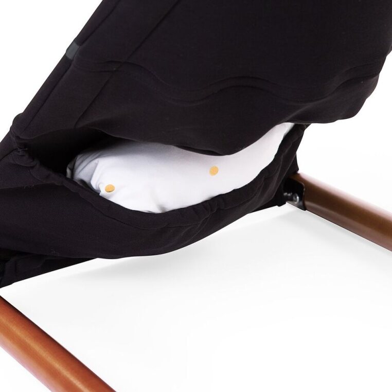 Childhome Evolux Bouncer (Black/Nut) - Back view showcasing the storage compartment for toys or baby essentials.